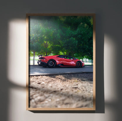 Lamborghini Huracan red sports car poster with green trees background wall art.