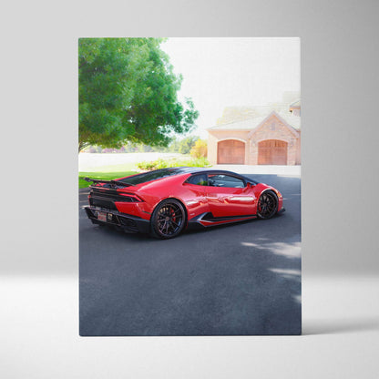 Red Lamborghini Huracan parked on driveway with trees and house background canvas wall art.