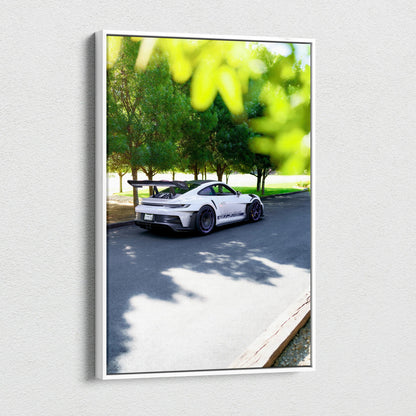 Vertical canvas art featuring a white Porsche 911 GT3 RS parked by trees, vibrant wall art.
