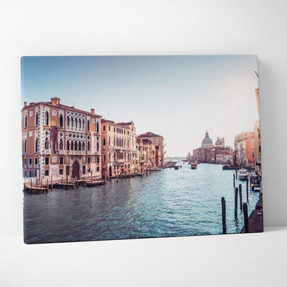 Canvas wall art featuring a serene Venice canal scene with historic buildings and soft blue sky.