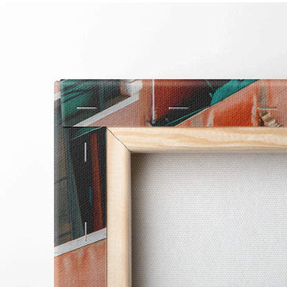 Close-up of corner of canvas wall art with natural wooden frame and vibrant architectural digital print.