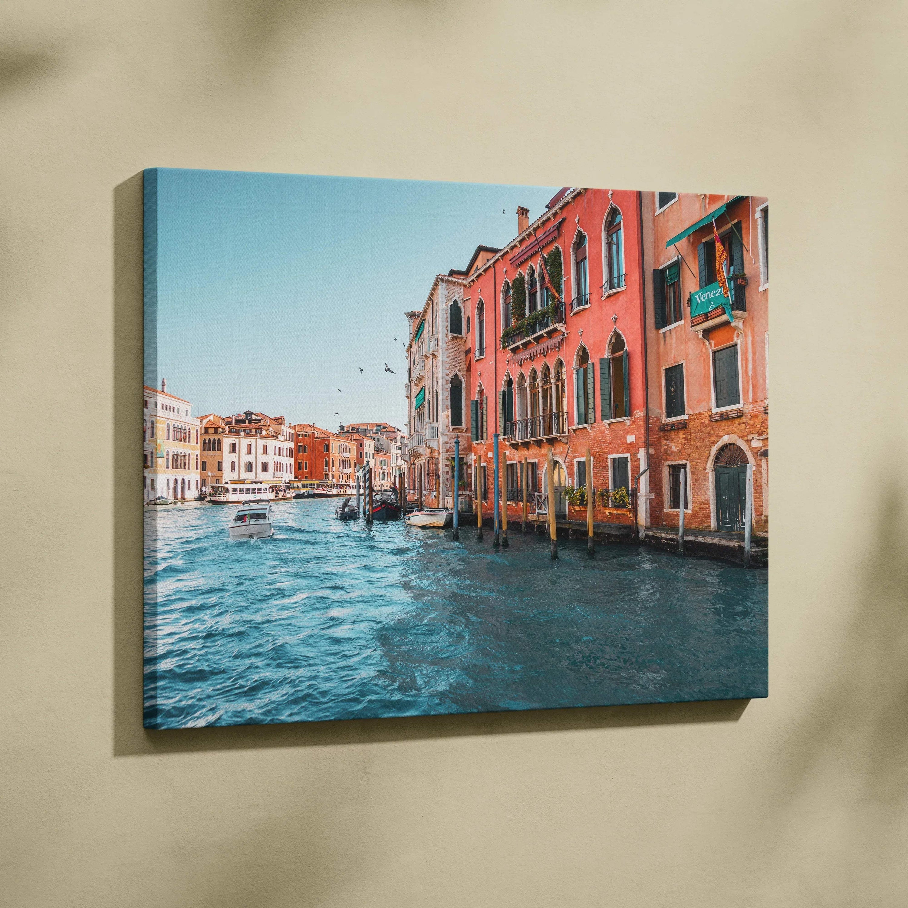 Canvas wall art featuring stunning digital art of colorful Venetian buildings along a canal under a clear blue sky.