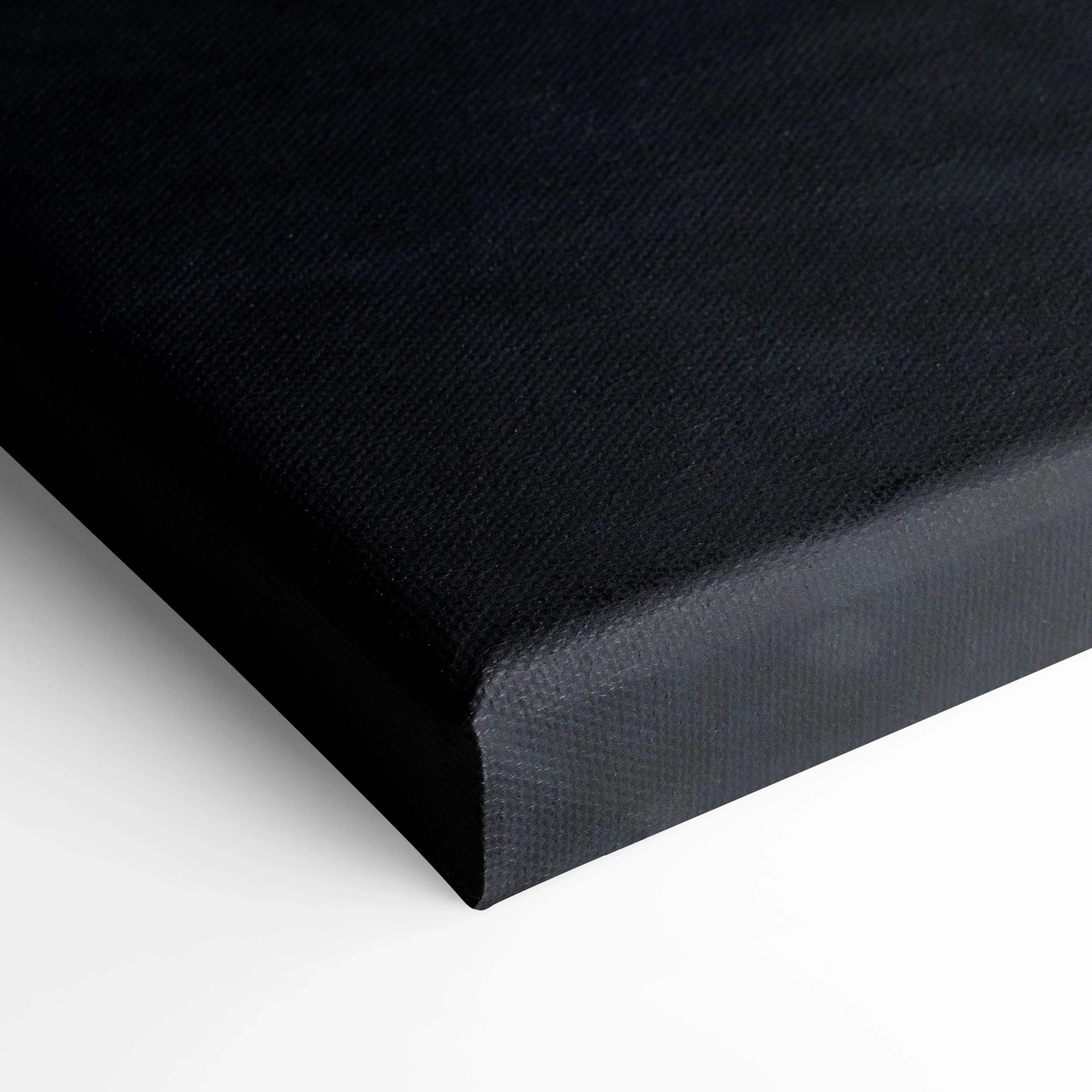 Close-up of black textured canvas wrap corner for vertical wall art canvas print.