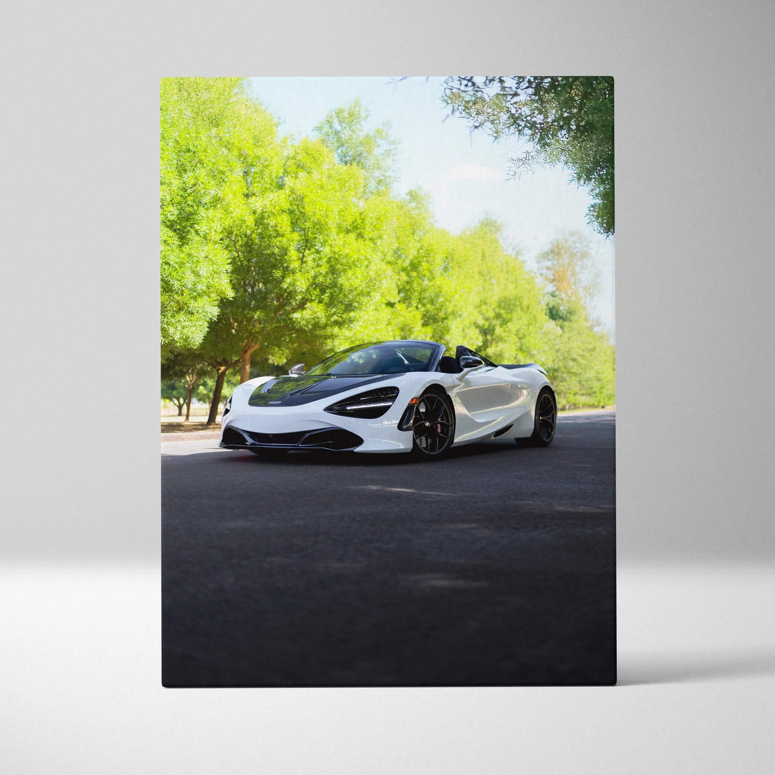 Vertical canvas wall art of white McLaren 720S sports car on road with trees background.
