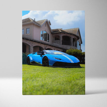 Blue Lamborghini Huracan parked on grass in front of luxury house vertical canvas art.