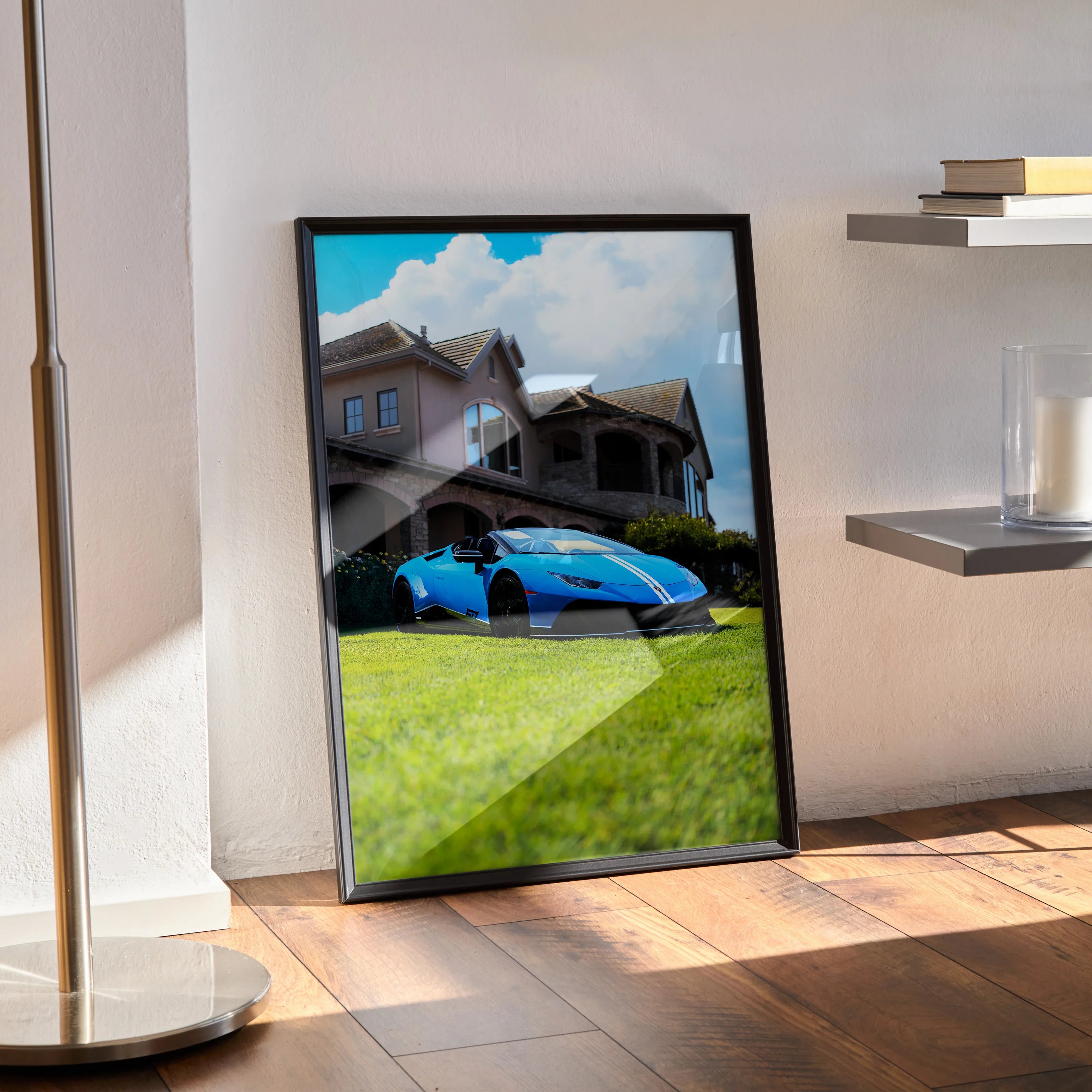 Lamborghini Huracan poster with bright blue sports car parked on green lawn wall art.