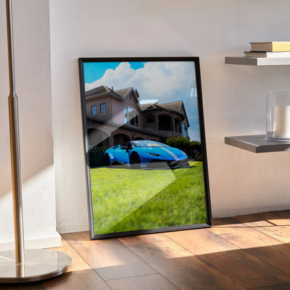 Lamborghini Huracan poster with bright blue sports car parked on green lawn wall art.