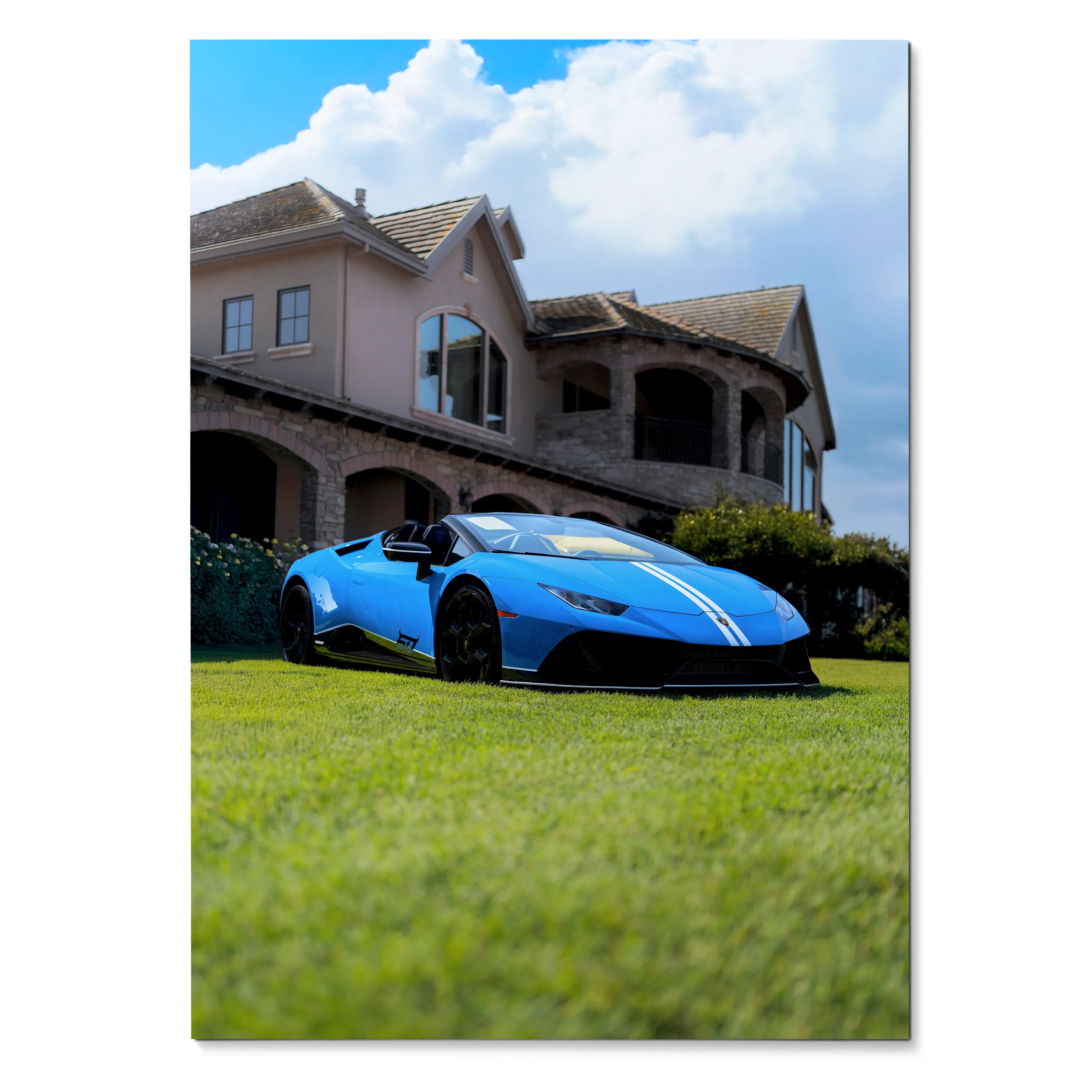 Lamborghini Huracan in vibrant blue with white racing stripes parked on grass in front of luxury house poster wall art.