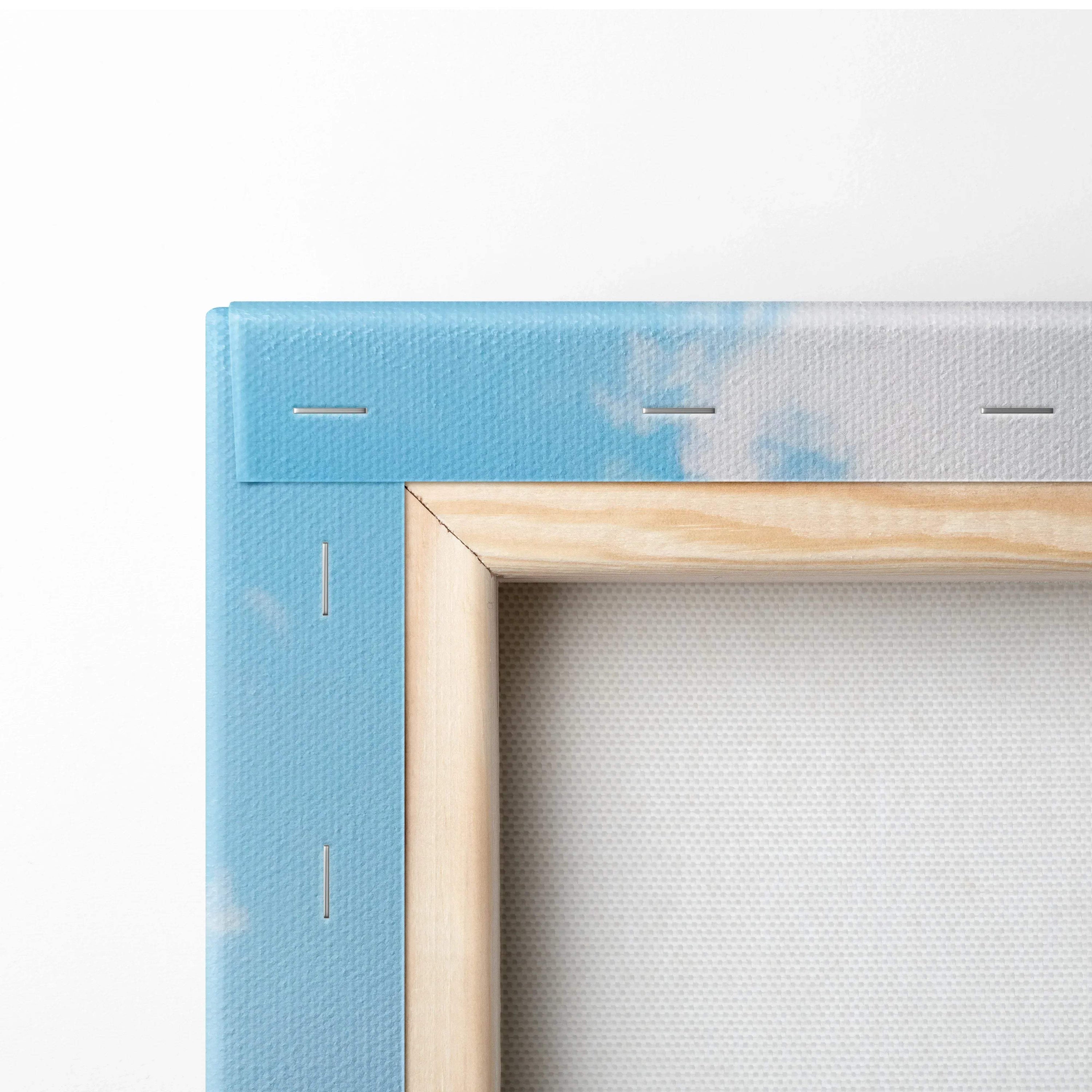 Close-up of wooden frame and stapled light blue canvas fabric for vertical wall art canvas print.