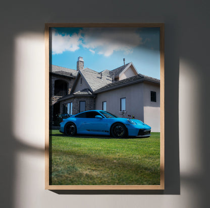 Porsche 911 GT3 in blue parked on grass with mansion background poster wall art.