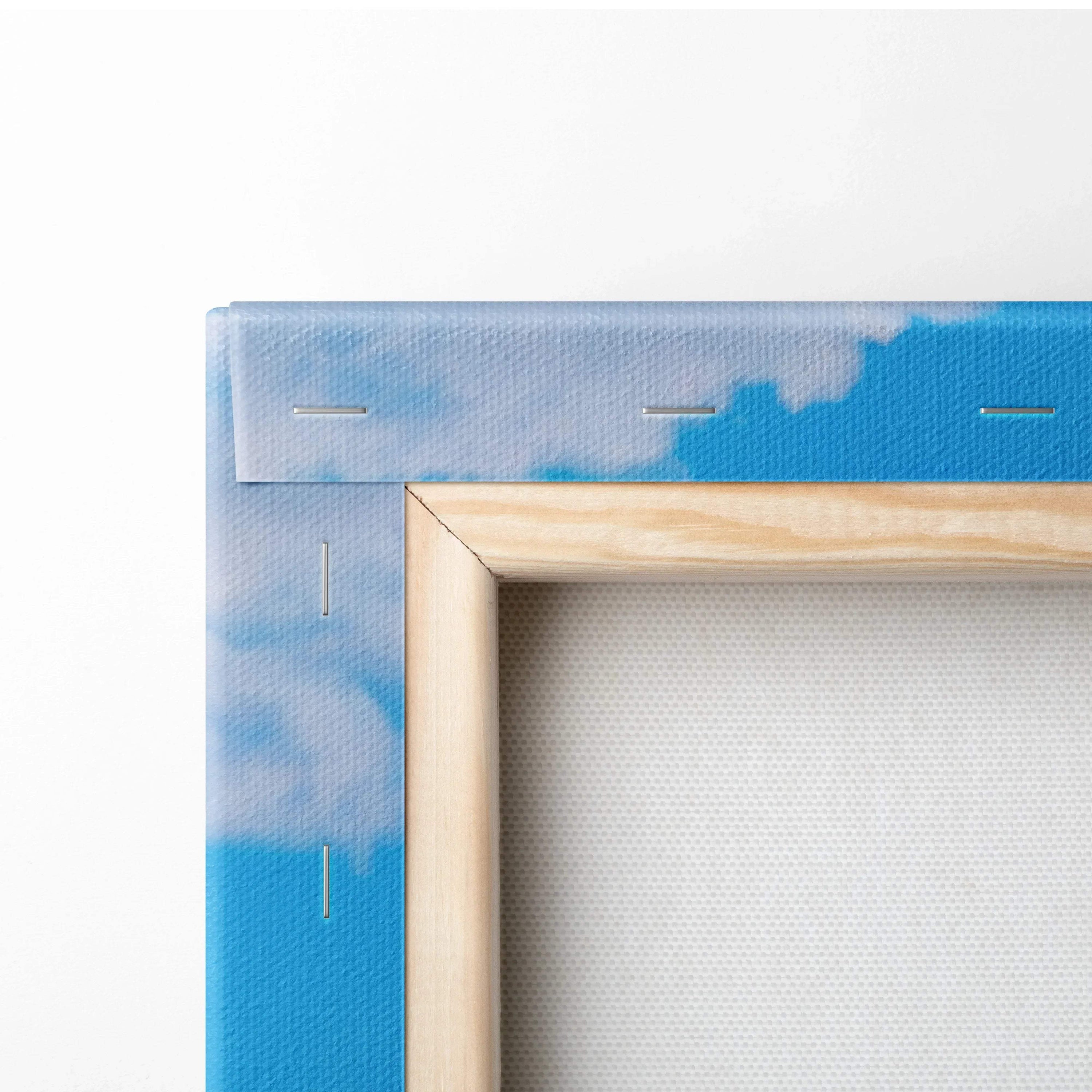 Close-up of a wooden frame edge with blue sky and clouds canvas wall art.