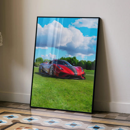 Koenigsegg Regera red sports car on grass with blue sky poster wall art in black frame.