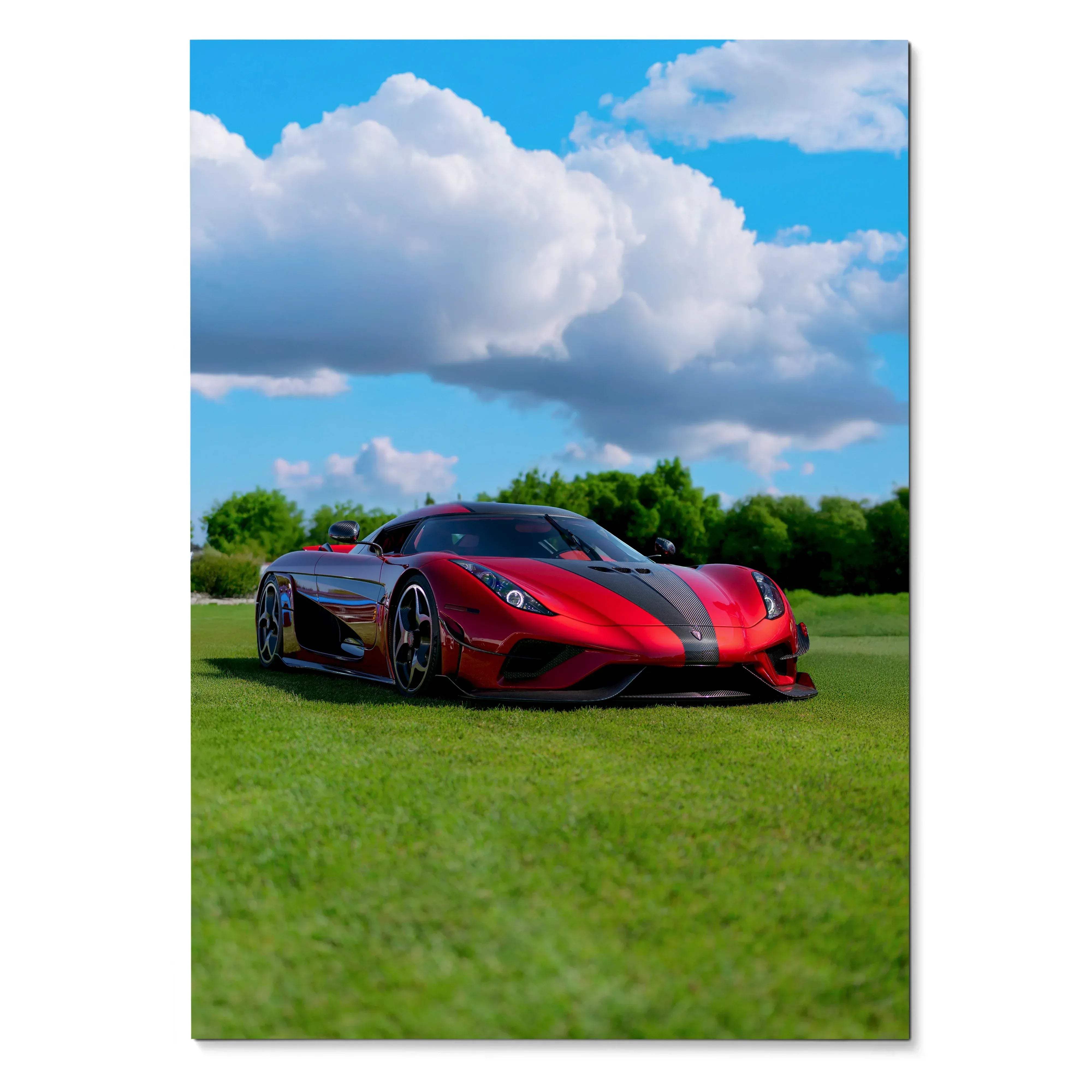Koenigsegg Regera red sports car on green grass under bright blue sky poster wall art.