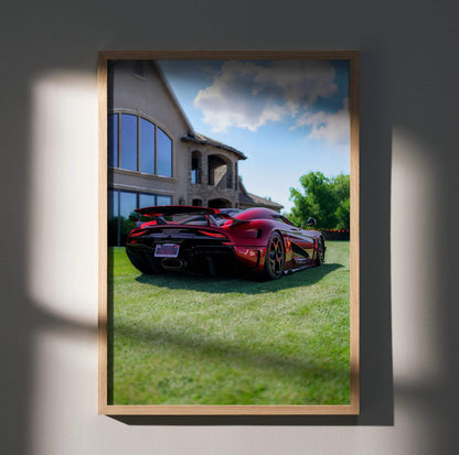 Koenigsegg Regera high-resolution poster featuring sleek red sports car parked on green grass wall art.