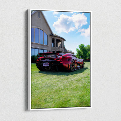 Koenigsegg Regera red sports car parked on grass near modern house canvas wall art.