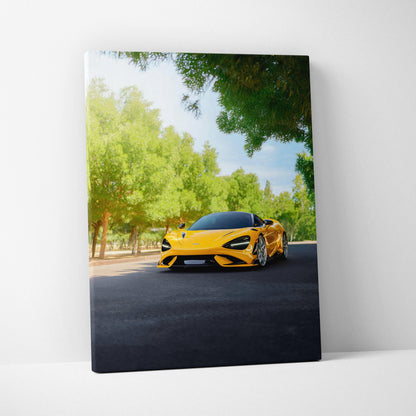Yellow McLaren 765LT on road surrounded by green trees vertical canvas wall art.