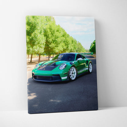 Vertical canvas art of a green Porsche 911 GT3 RS parked on a tree-lined street, vibrant wall art.