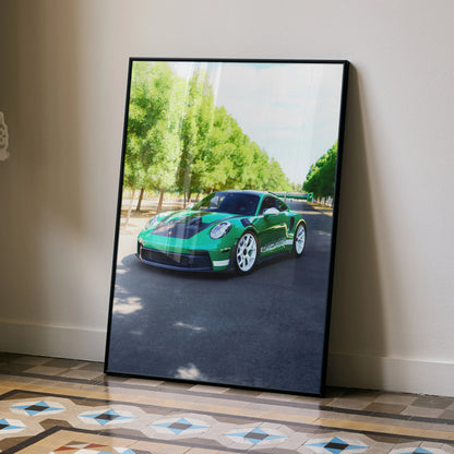 Porsche 911 GT3 RS in green on road with trees wall art poster in black frame.