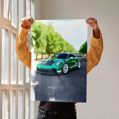 Porsche 911 GT3 RS green sports car on road poster wall art held up in bright room.