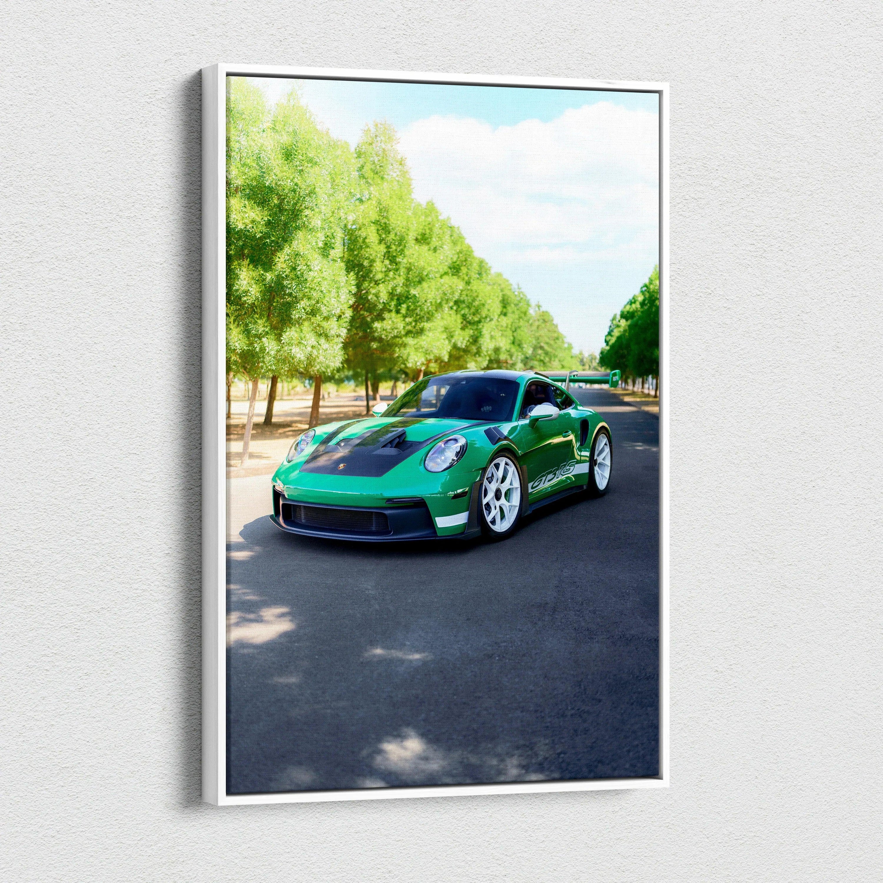 Porsche 911 GT3 RS green sports car on road surrounded by trees vertical canvas wall art.