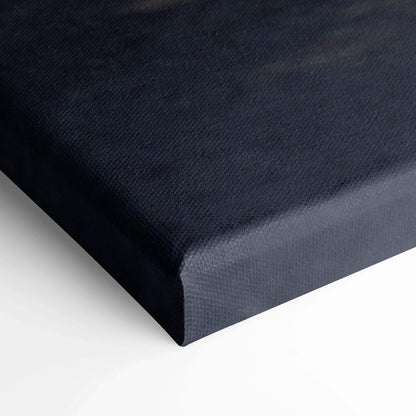 Close-up of black textured canvas edge showcasing premium museum-quality wall art and canvas print craftsmanship.