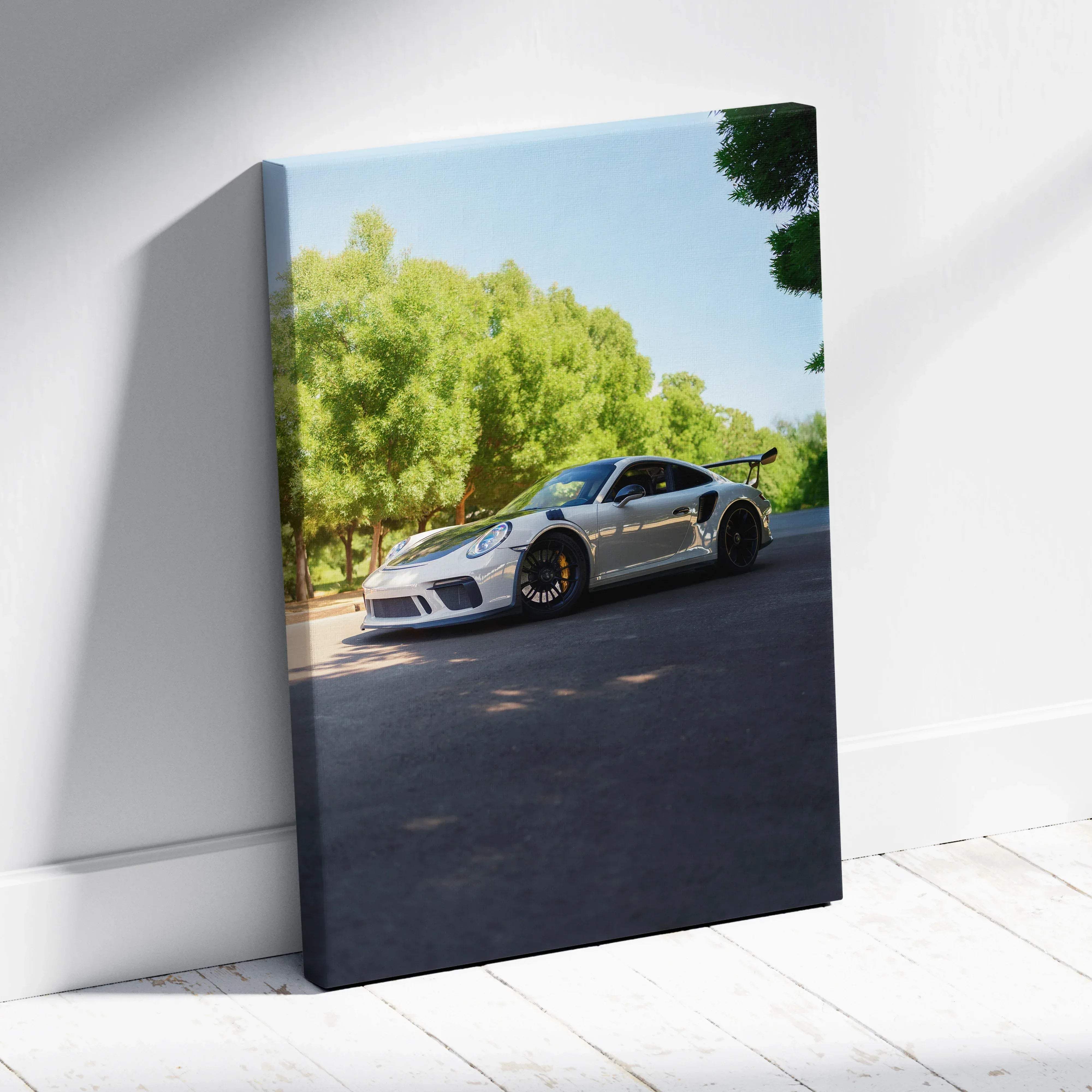 Silver porsche 911 gt3 rs vertical canvas print with black rims and yellow brake calipers high resolution car art