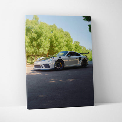 Porsche 911 GT3 white sports car on road with trees, vertical canvas wall art.