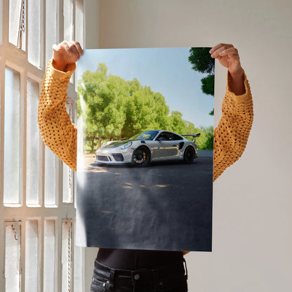 Porsche 911 GT3 sports car on street with green trees background poster wall art.