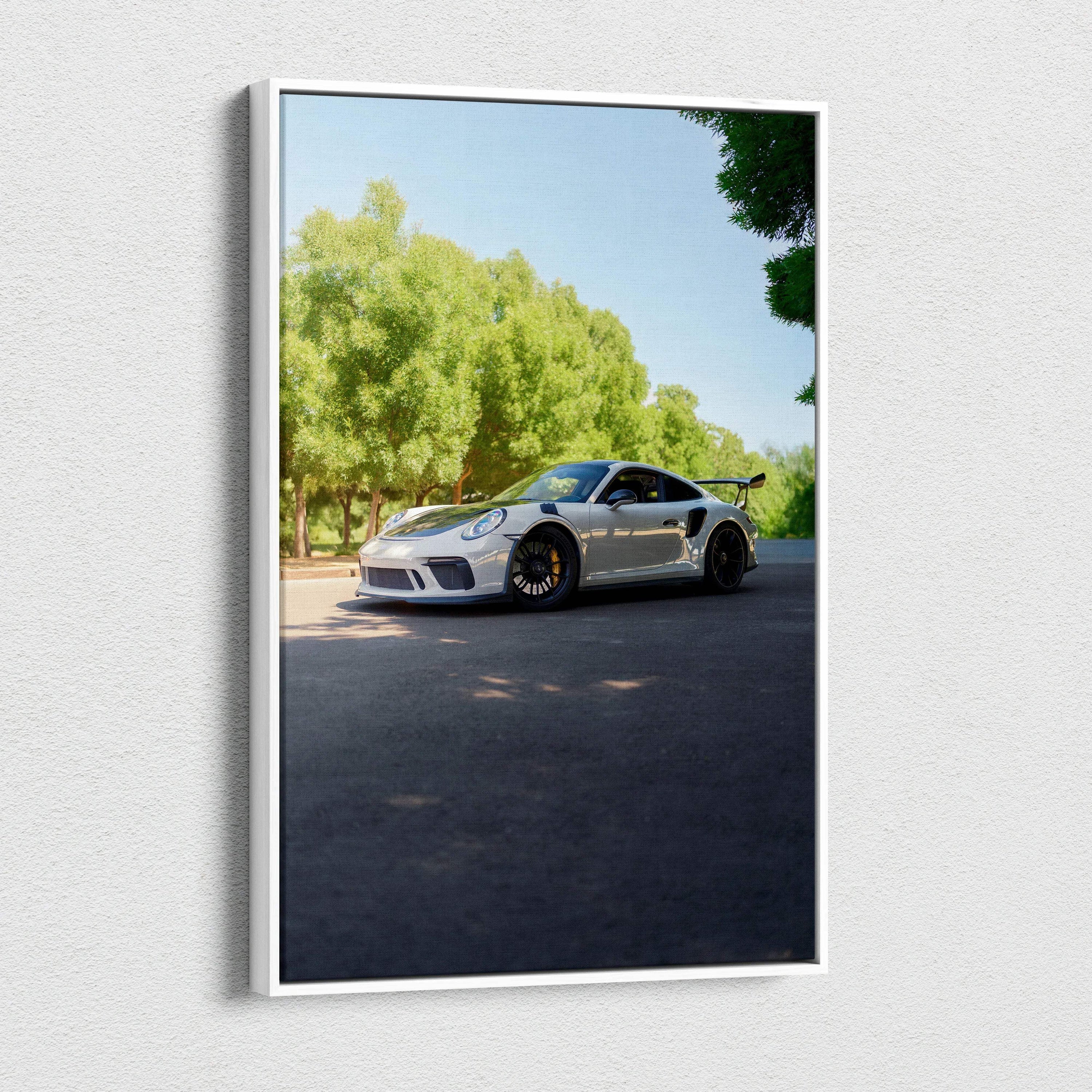 Vertical canvas wall art featuring a Porsche 911 GT3 parked under trees in bright daylight.