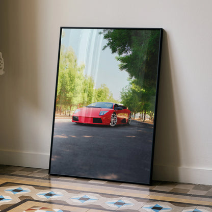 Lamborghini Murcielago red sports car on road surrounded by trees poster wall art.