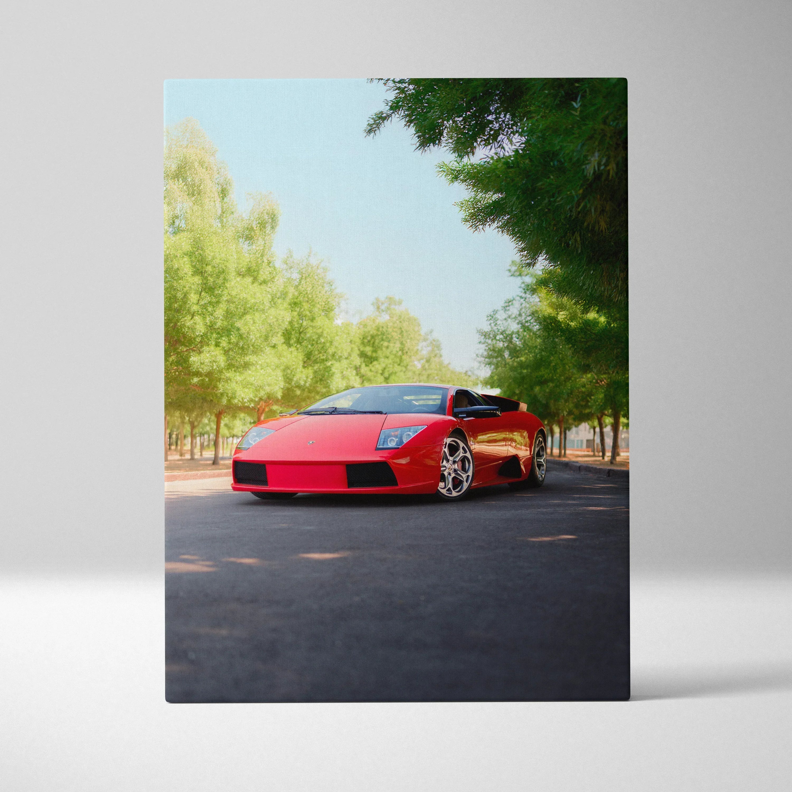 Red Lamborghini Murcielago on road with trees background vertical canvas art wall decor.