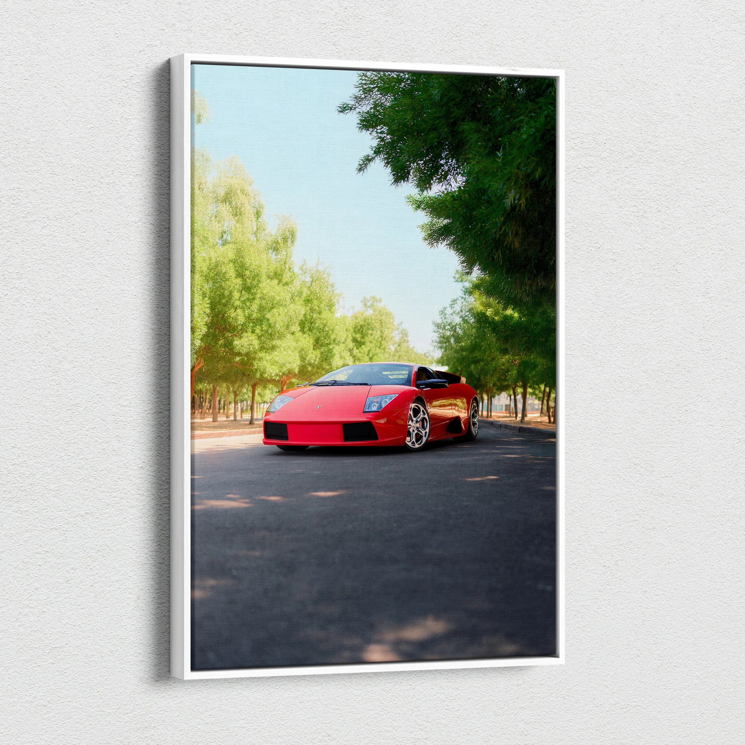 Vertical canvas art featuring a red Lamborghini Murcielago on a tree-lined road, vibrant wall art print.