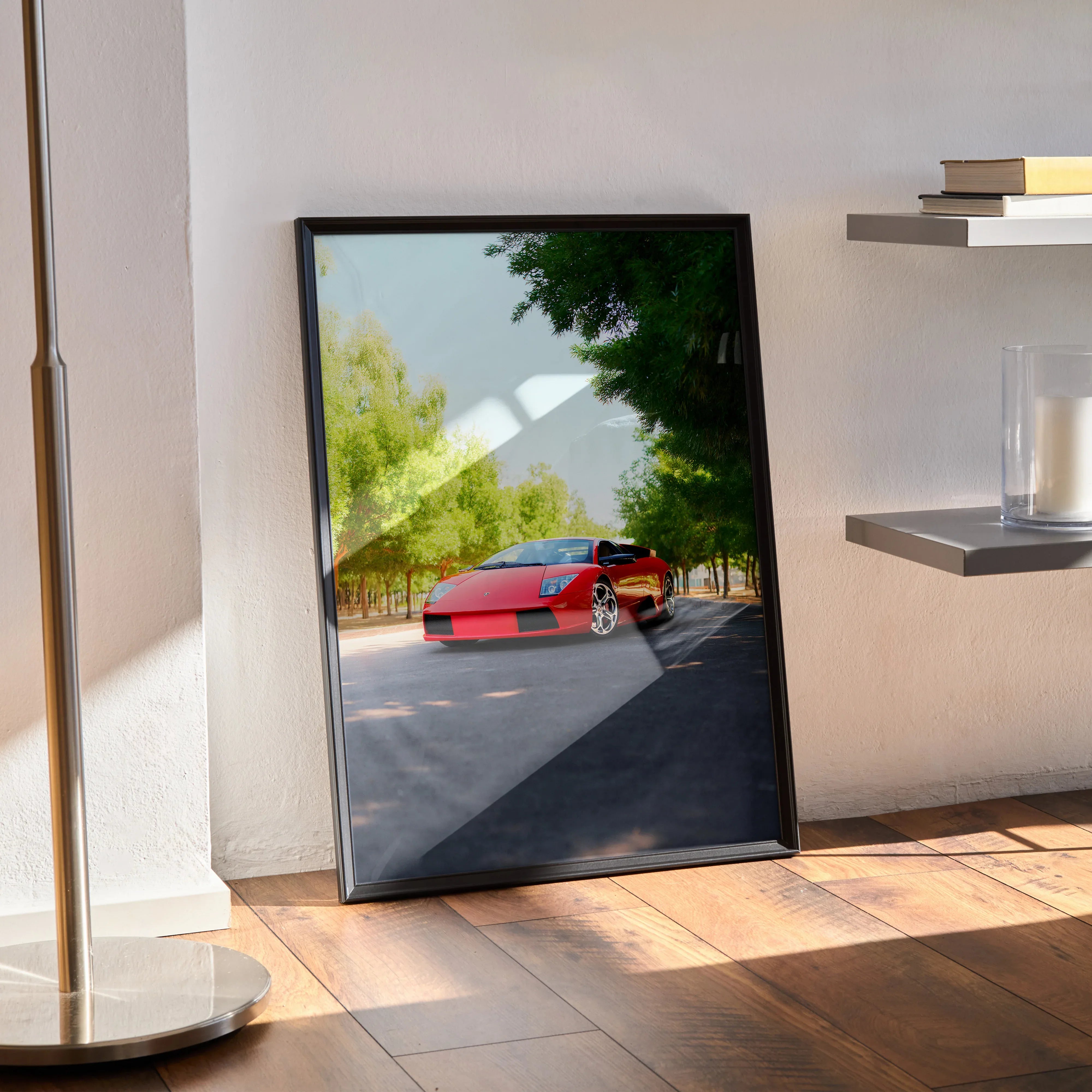 Lamborghini Murcielago poster with red car on road framed as modern wall art in sunlit room.
