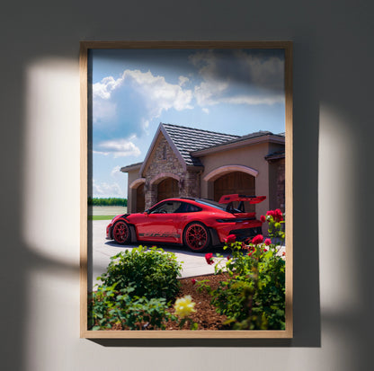 Porsche 911 GT3 RS in red parked outside luxury home wall art poster in wooden frame.