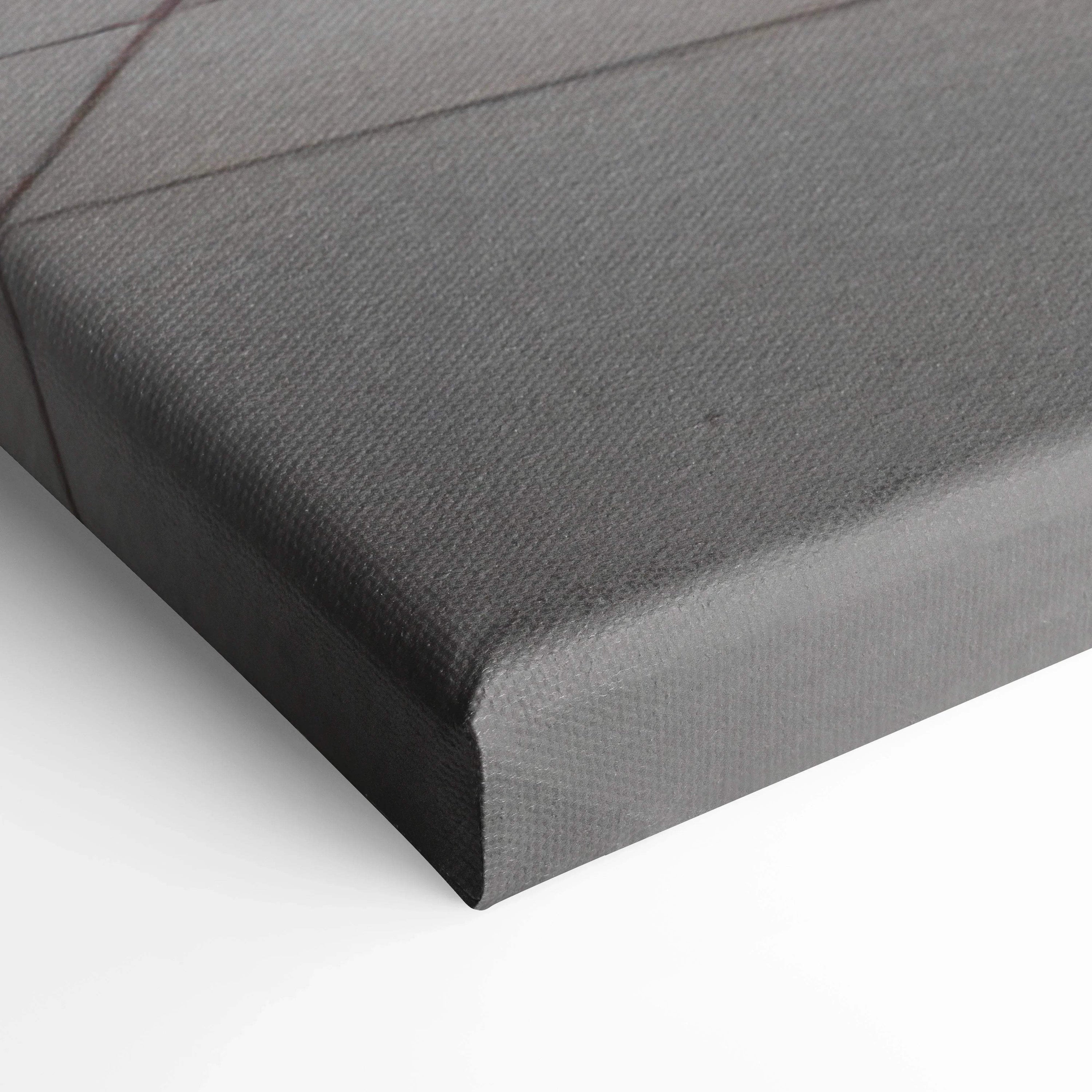 Gray textured canvas material stretched tightly over wooden frame corner for wall art canvas print.