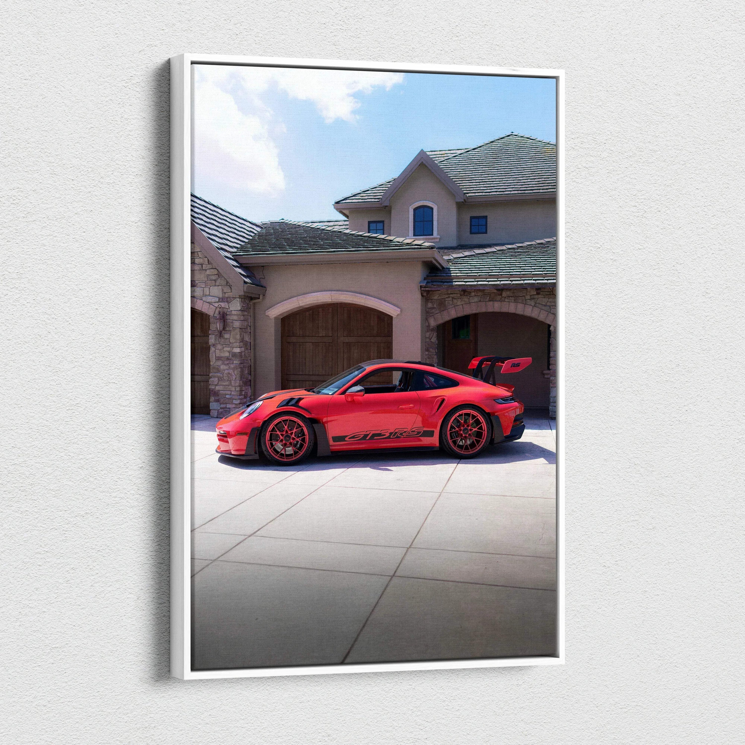 Red Porsche 911 GT3 RS parked in front of luxury home, vertical canvas wall art.
