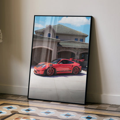 Porsche 911 GT3 RS red sports car poster leaning against wall on tiled floor wall art.