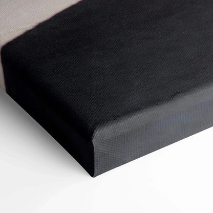 Close-up of black stretched canvas corner showcasing texture and sharp edges of wall art canvas print.