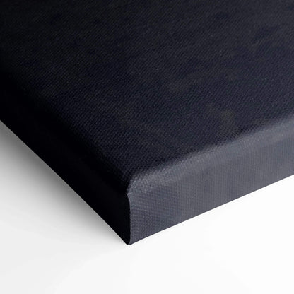 Close-up of black textured canvas wrap edge for wall art print.