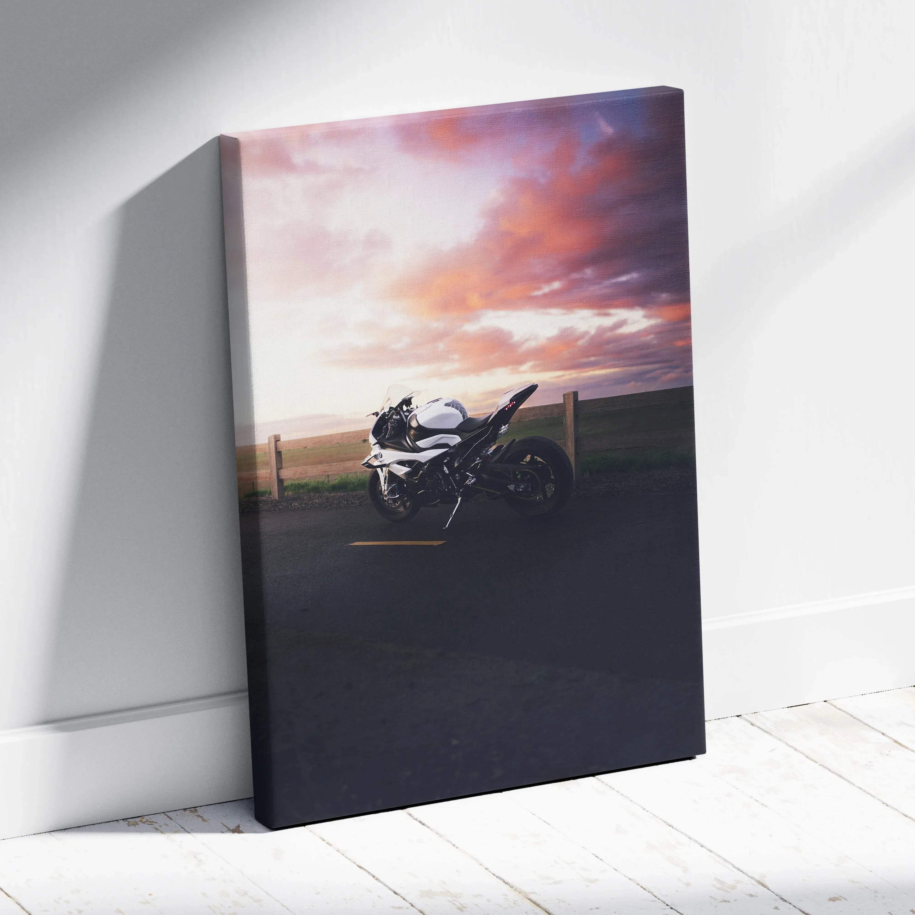BMW S1000RR motorcycle at sunset on canvas wall art with vibrant sky colors.