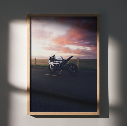BMW S1000RR motorcycle poster with sunset sky, framed wall art in natural wood frame.