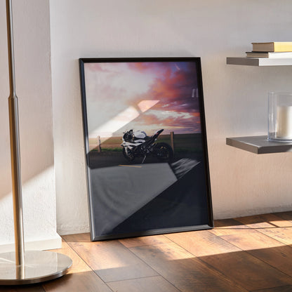 BMW S1000RR motorcycle poster with sunset background in black frame wall art.