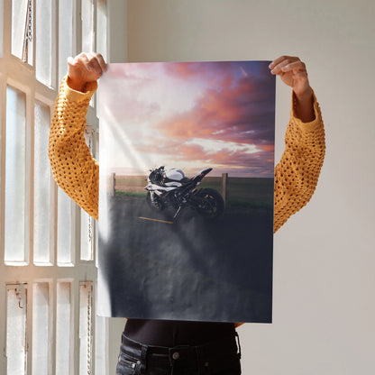 Poster of BMW S1000RR motorcycle at sunset with dramatic sky, motorcycle wall art.