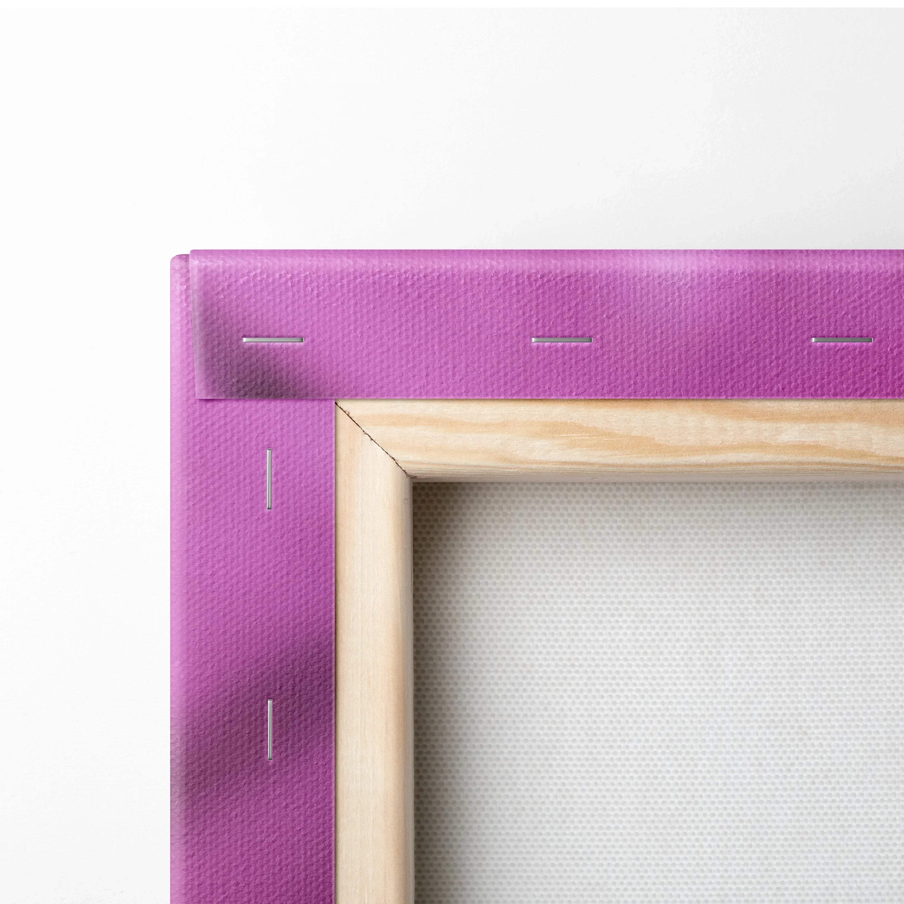 Close-up of stretched pink canvas fabric with visible stapled wooden frame for wall art decor.