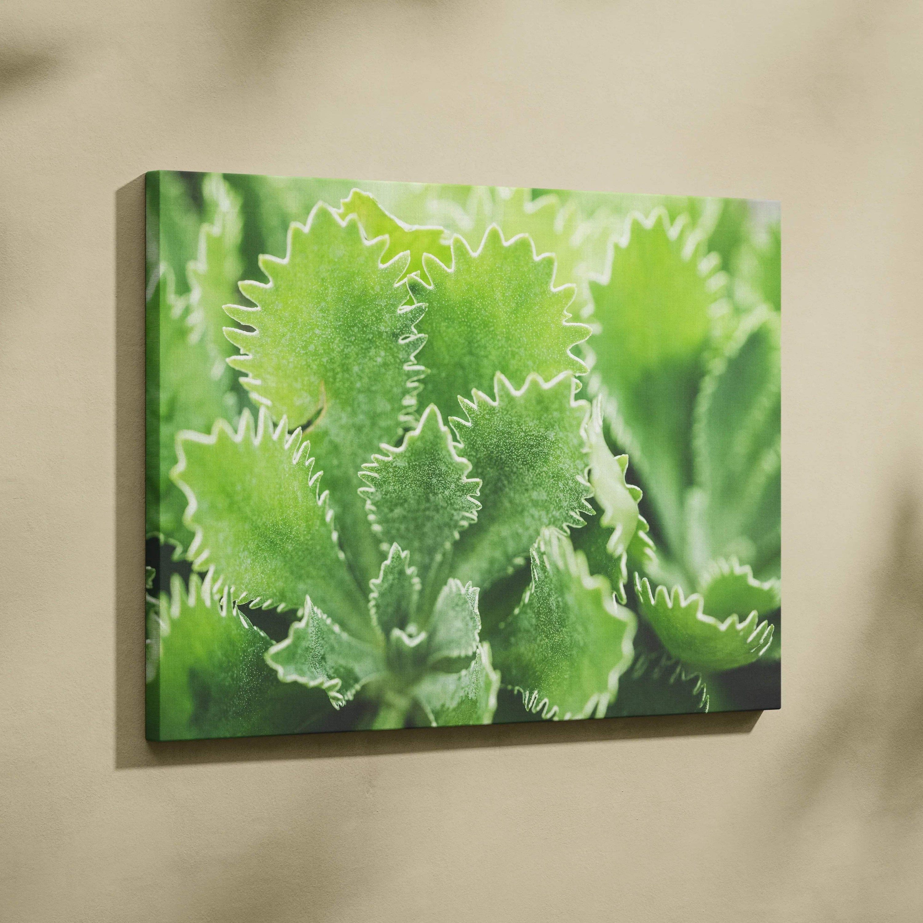 Vibrant green leaves close-up canvas wall art with textured natural detail for home decor.