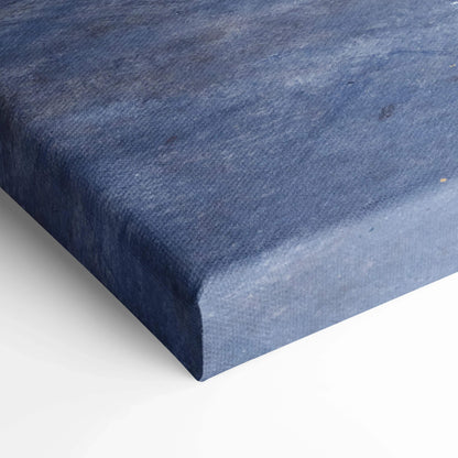 Close-up of textured blue canvas art corner showcasing premium wall art material and edge wrapping.