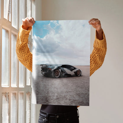 Lamborghini Huracan black and white car on dusty road poster wall art with blue sky background.