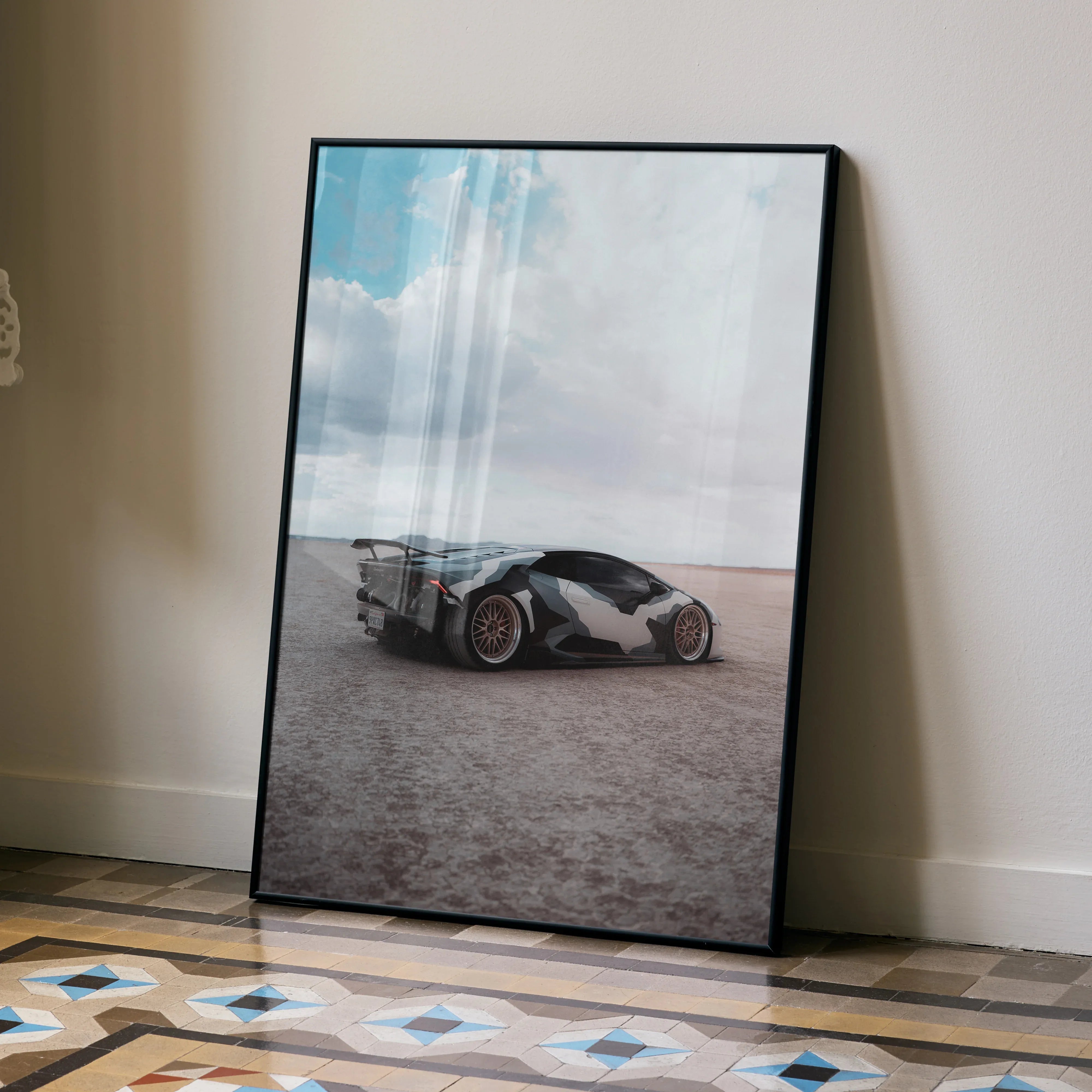 Lamborghini Huracan poster showing sleek white sports car on desert background, framed wall art.