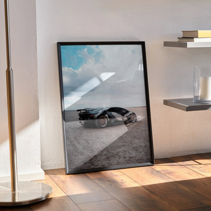 Lamborghini Huracan poster with sleek black car on desert road under blue sky wall art.