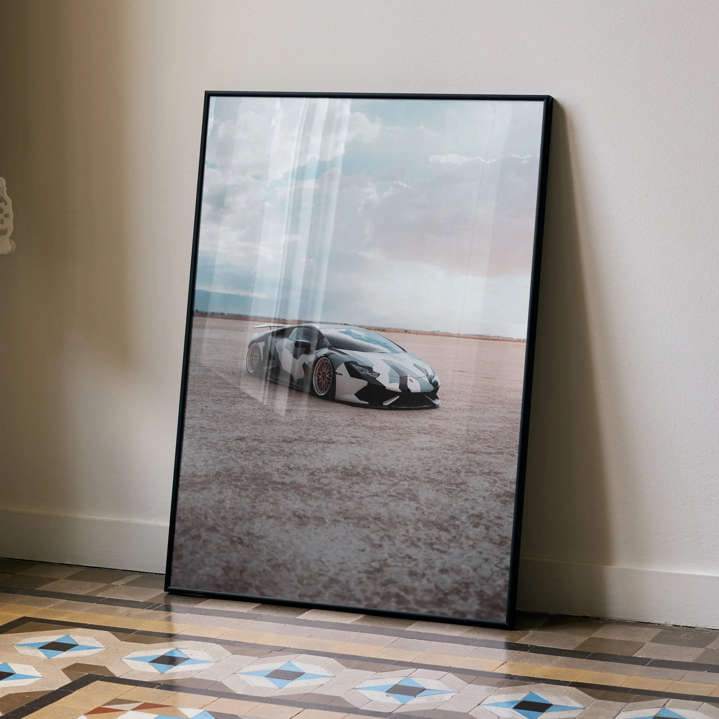 Lamborghini Huracan poster with sleek black sports car on desert landscape wall art.